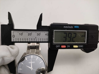 SEIKO V157-0BX0 Solar Titanium Men's Watch