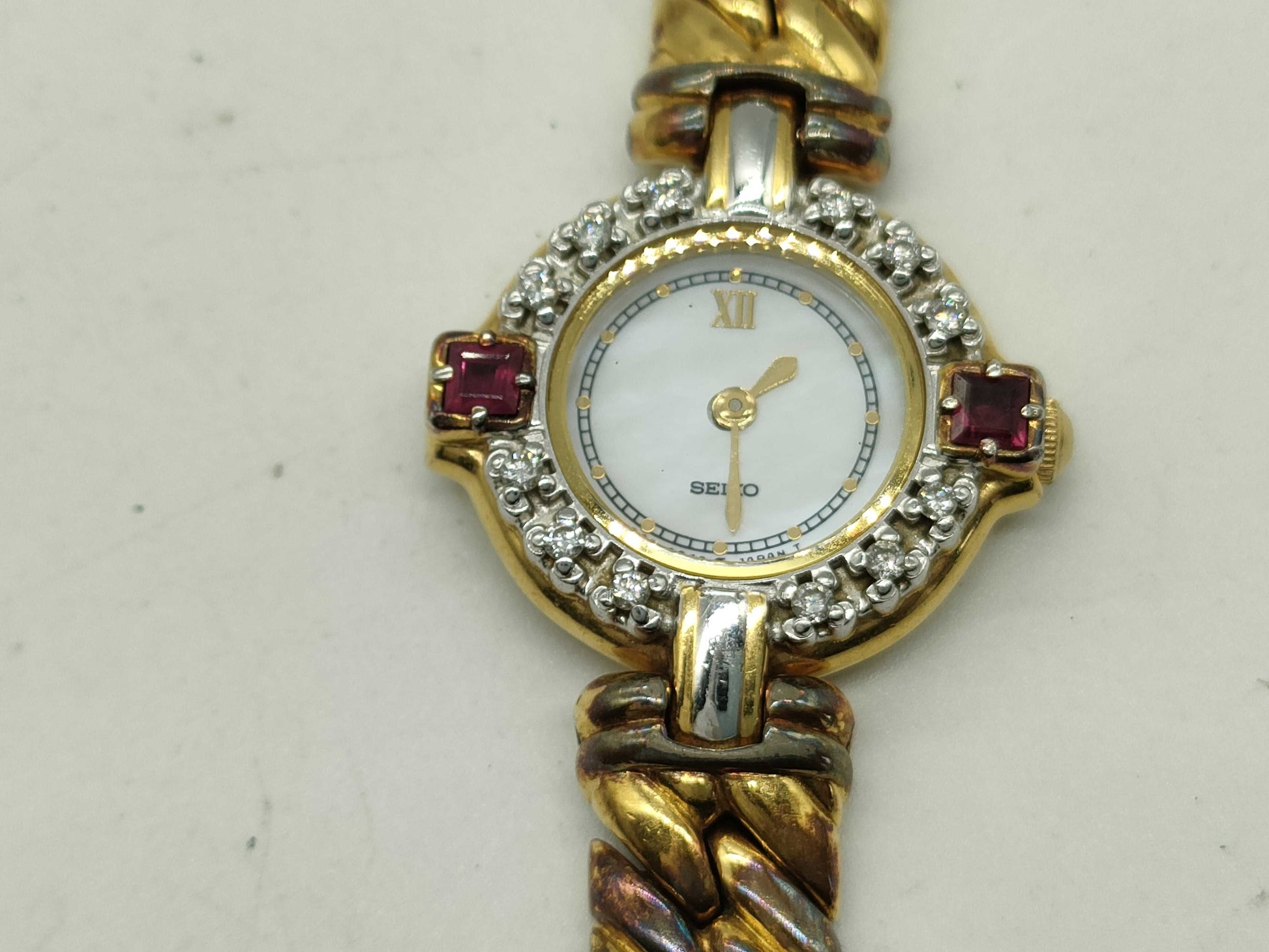 SEIKO Diamond and Ruby Bezel 1F20-0B70 Women's Watch