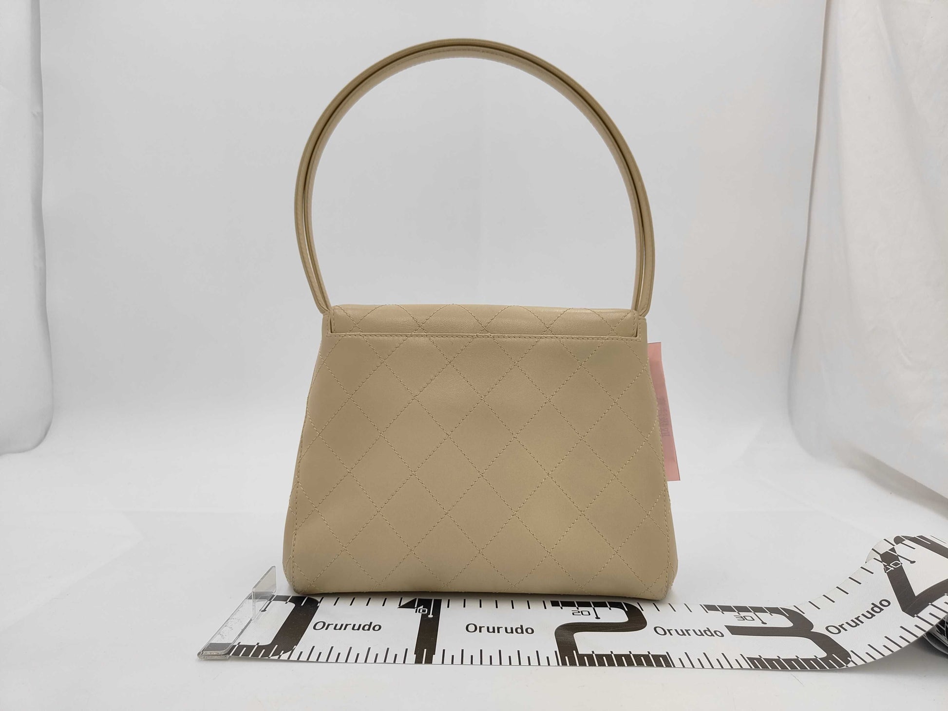 CHANEL Beige Lambskin Handbag with GD Hardware