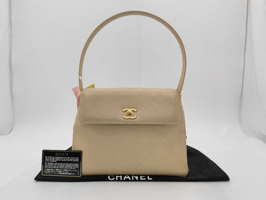 CHANEL Beige Lambskin Handbag with GD Hardware