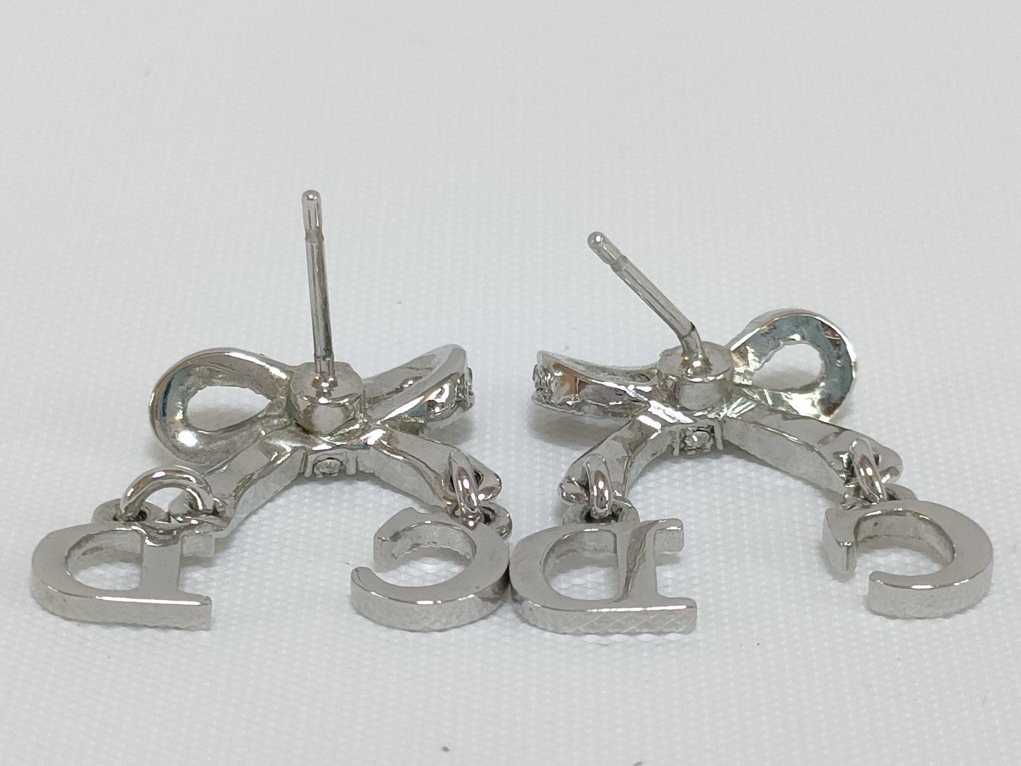 Dior CD logo ribbon rhinestone earrings