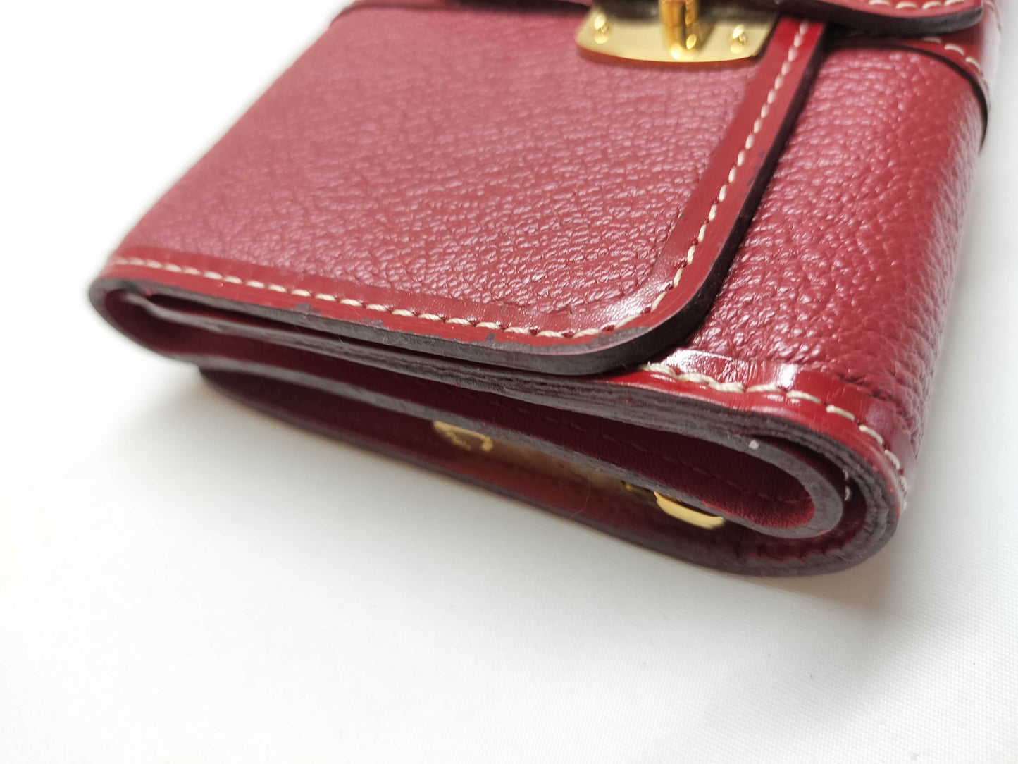 LOUIS VUITTON Taiga wallet with initials