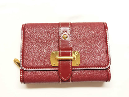 LOUIS VUITTON Taiga wallet with initials