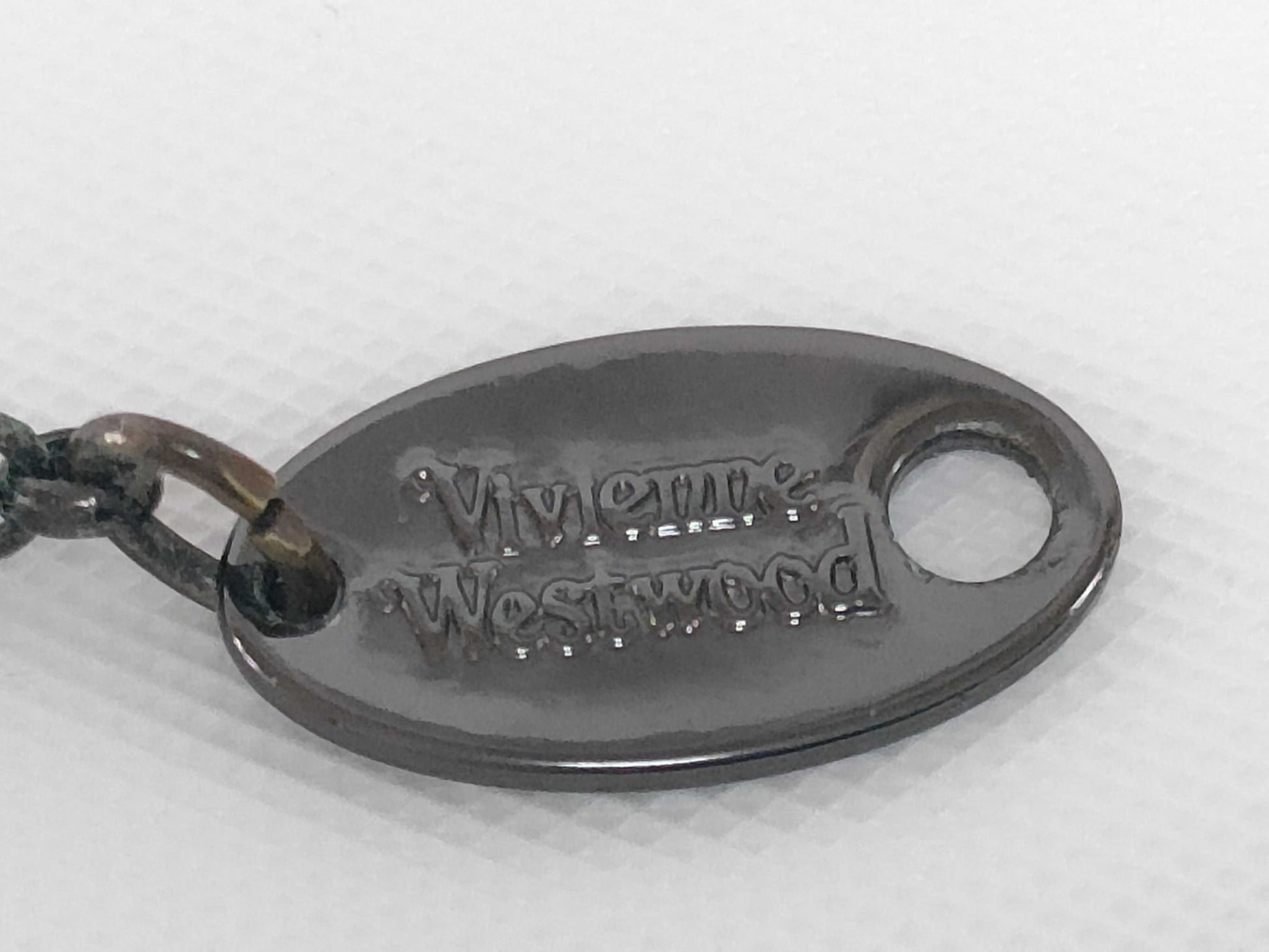 Tiffany & Co. 925 top/Gucci earrings/Vivienne Westwood necklace 