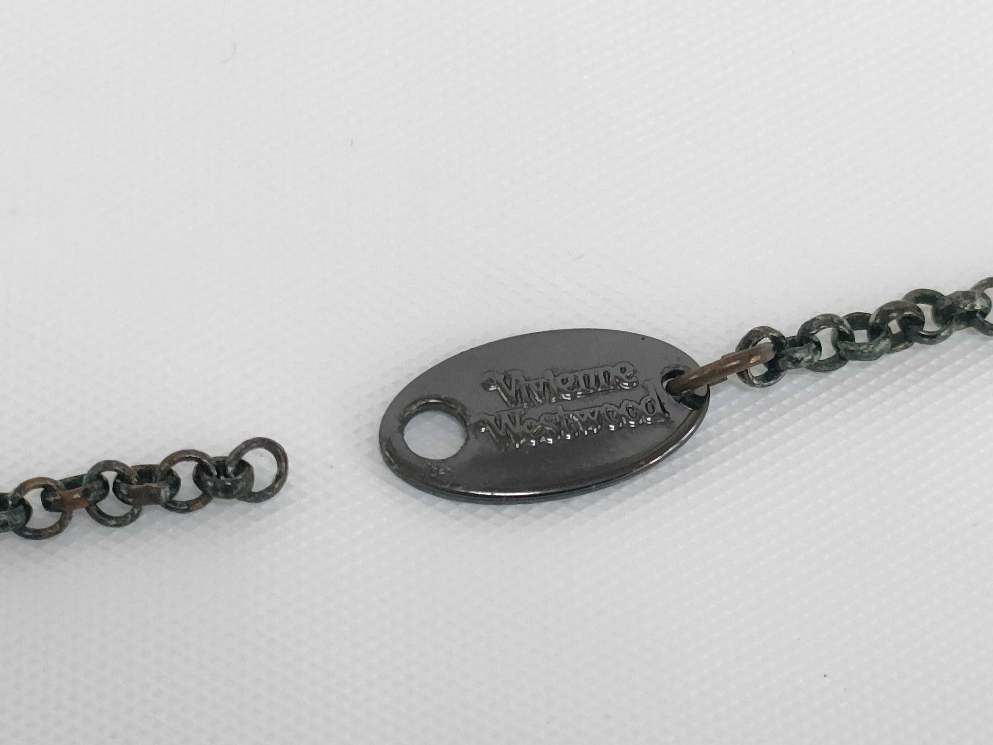 Tiffany & Co. 925 top/Gucci earrings/Vivienne Westwood necklace 