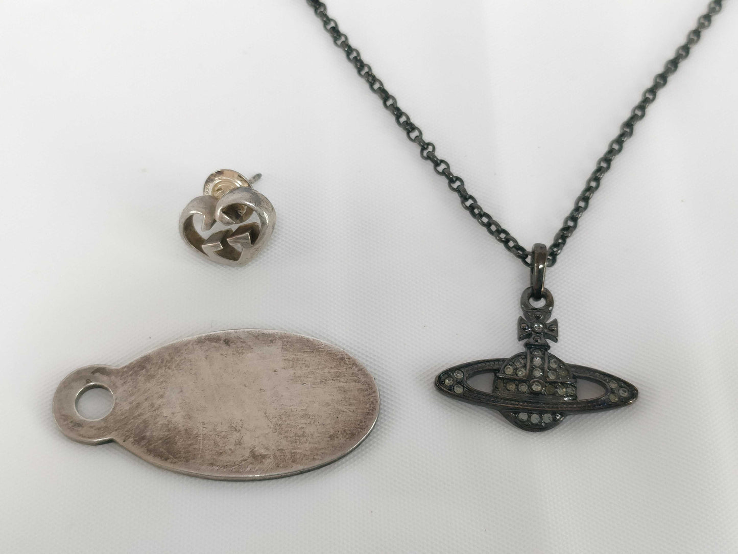 Tiffany & Co. 925 top/Gucci earrings/Vivienne Westwood necklace 