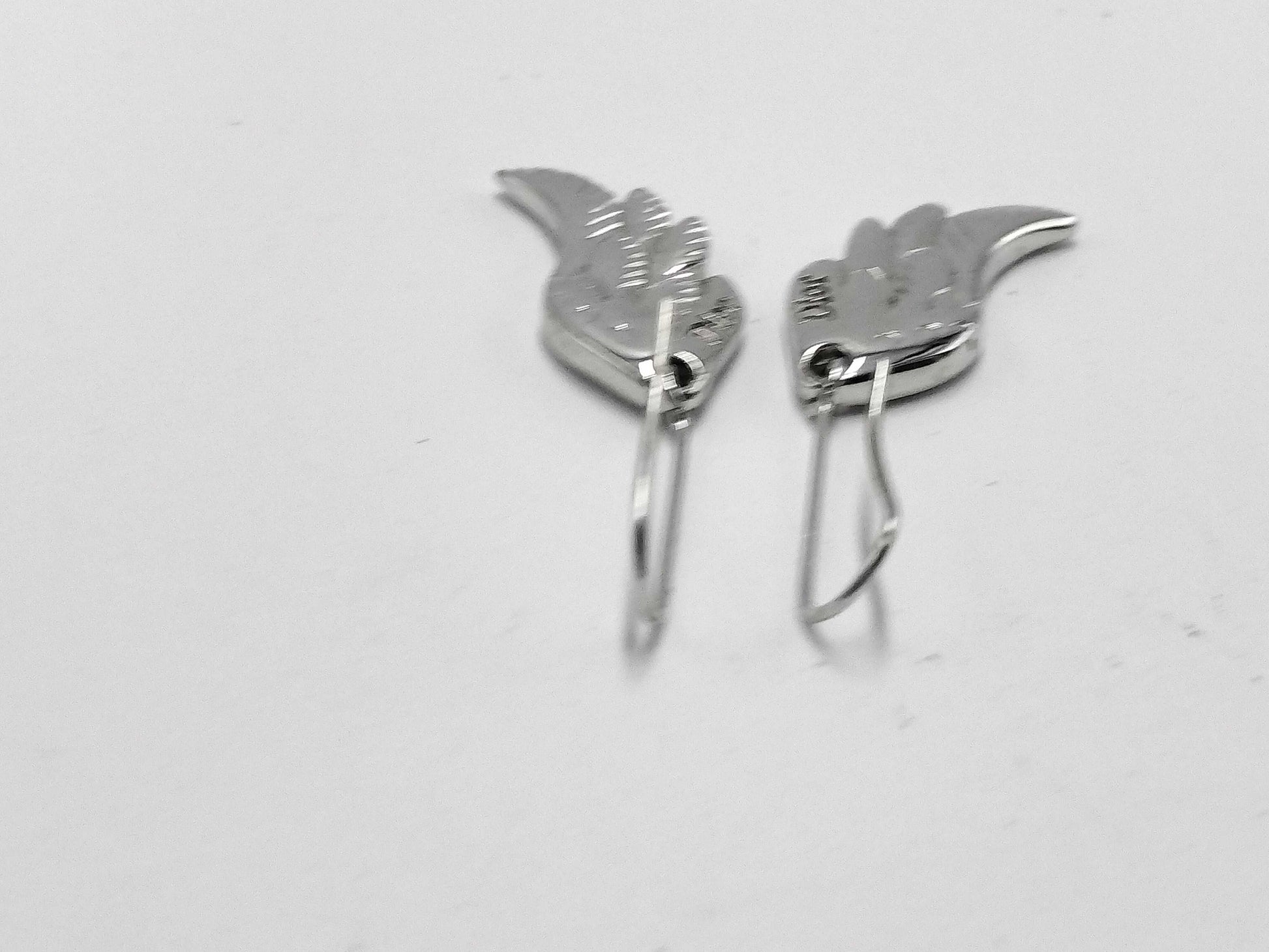 Dior feather earrings