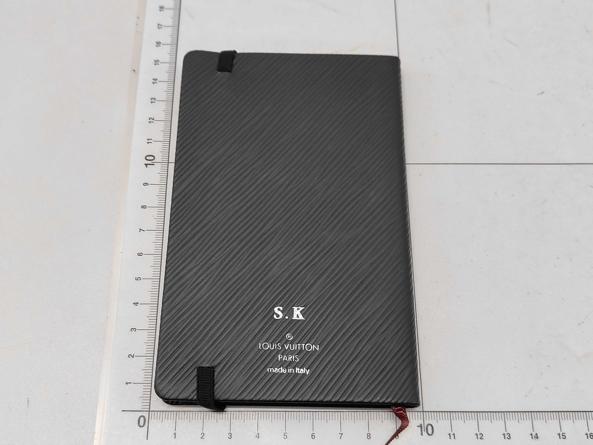 LOUIS VUITTON Taiga Cahier Gustave Notebook with Initials and Other Accessories