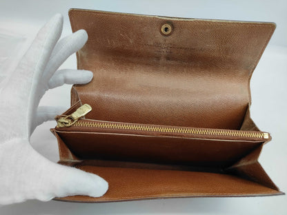 LOUIS VUITTON Monogram Postfeuille Sarah Wallet