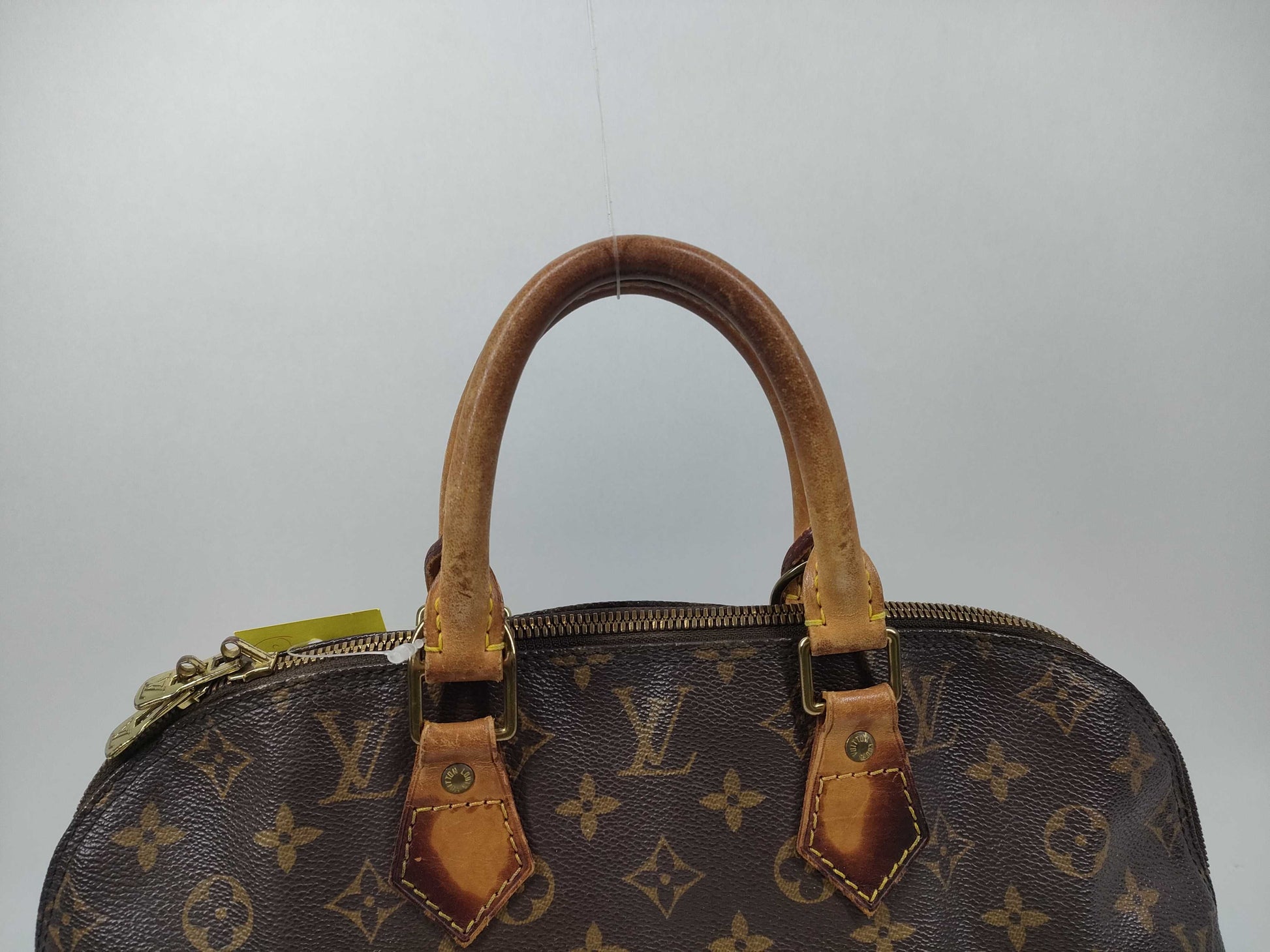 LOUIS VUITTON Monogram Alma Handbag