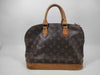 LOUIS VUITTON Monogram Alma Handbag