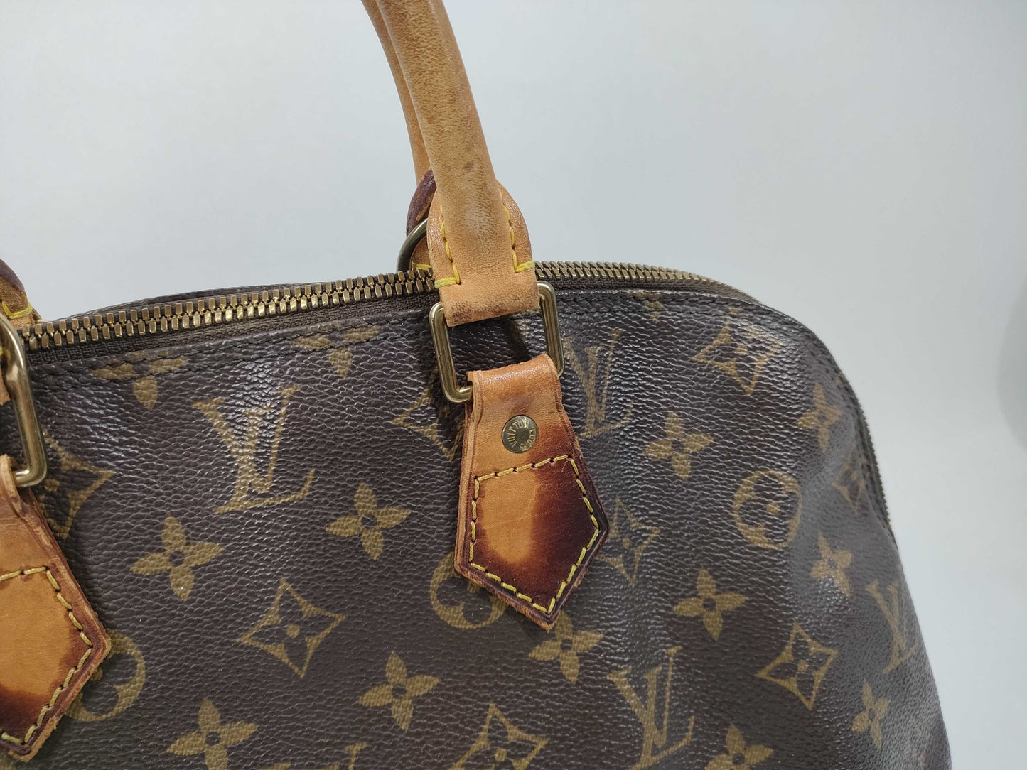 LOUIS VUITTON Monogram Alma Handbag