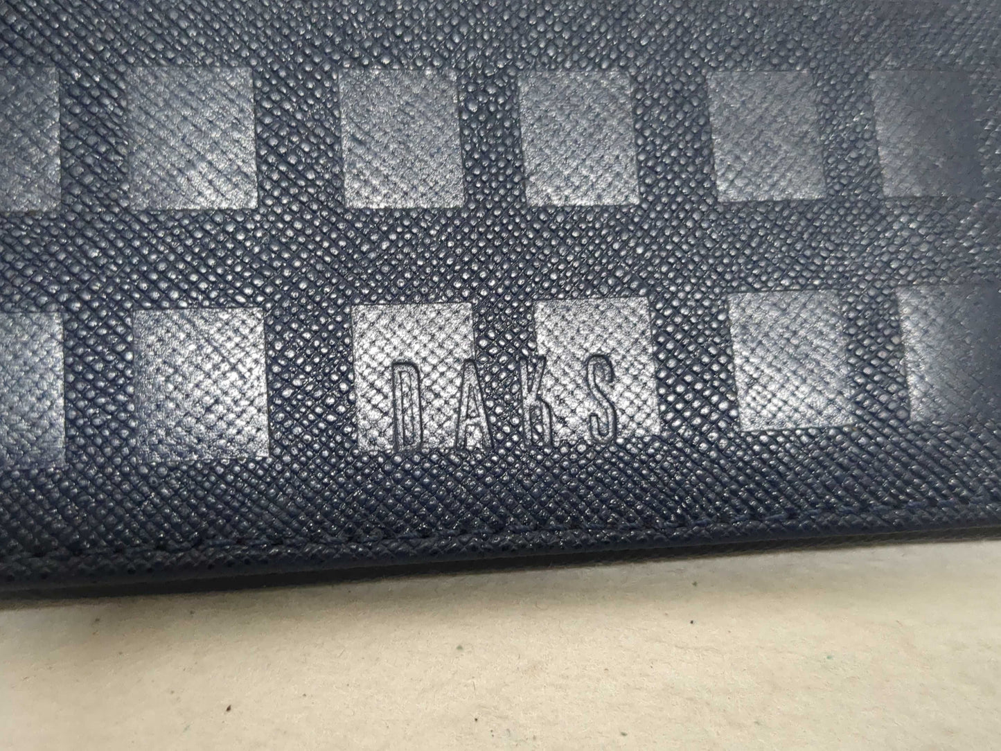 Salvatore Ferragamo, Louis Vuitton, and other wallets