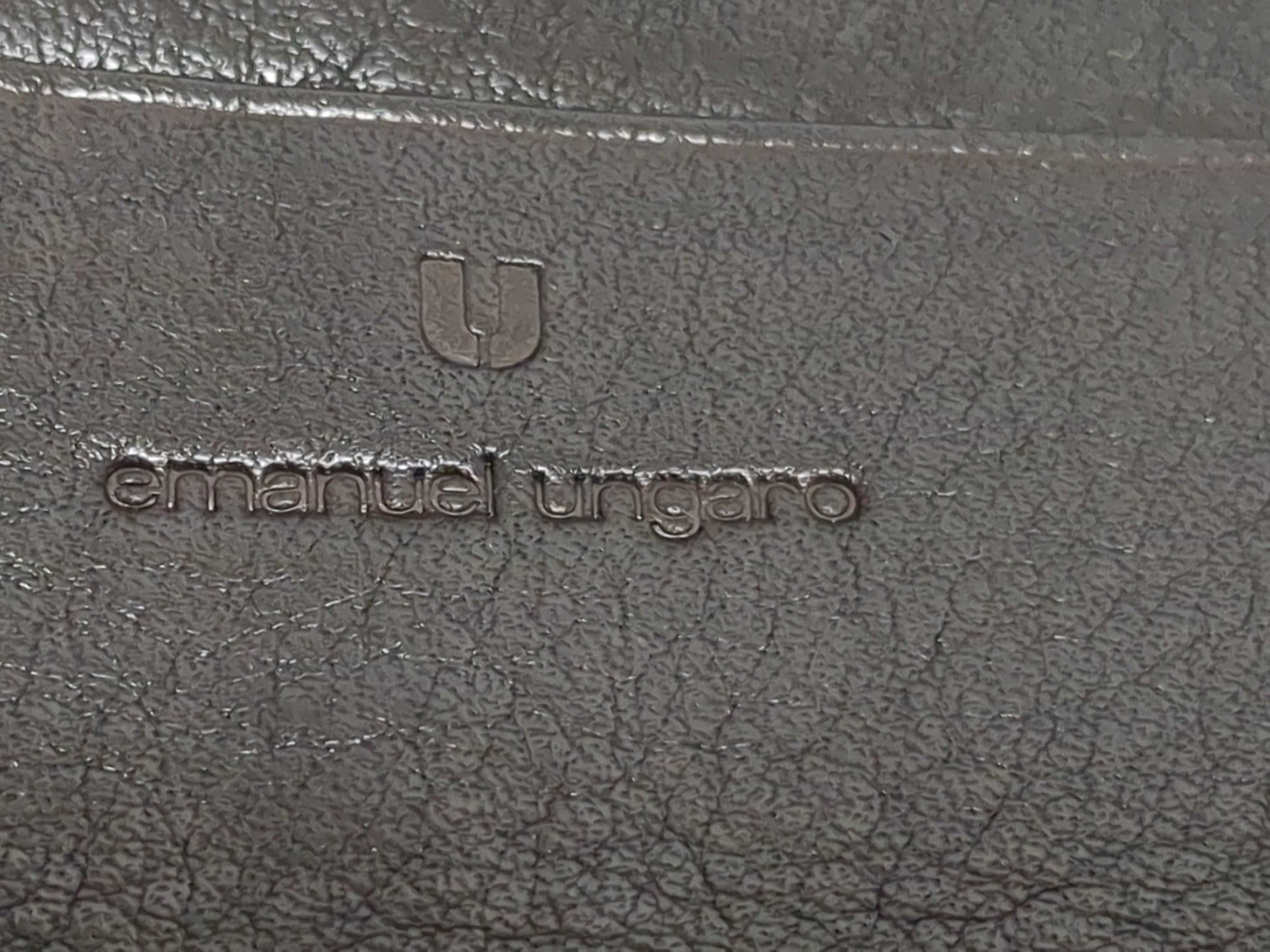 Salvatore Ferragamo, Louis Vuitton, and other wallets