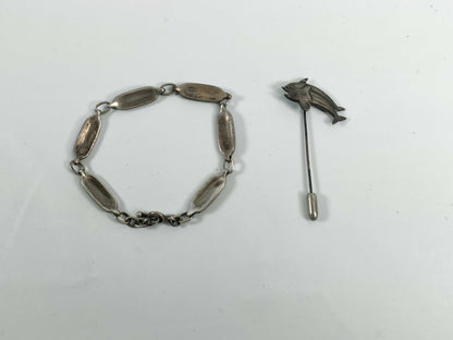 Georg Jensen brooch, bracelet, and two other items, 19.3g. Accessories Collection. Accessories Collection.