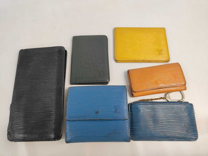 LOUIS VUITTON 9. 5 wallets including Louis Vuitton Epi wallets and other accessories