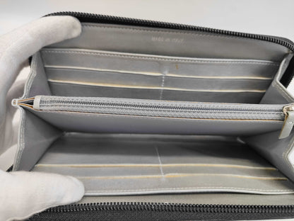 CHANEL Camellia Zippy Wallet