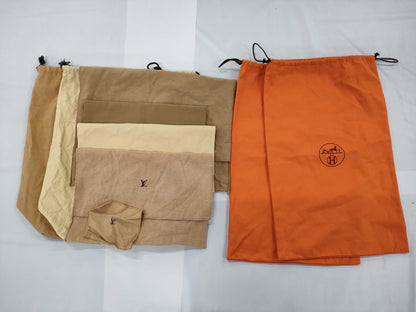 8 storage bags, 6 Louis Vuitton and 2 Hermes storage bags 